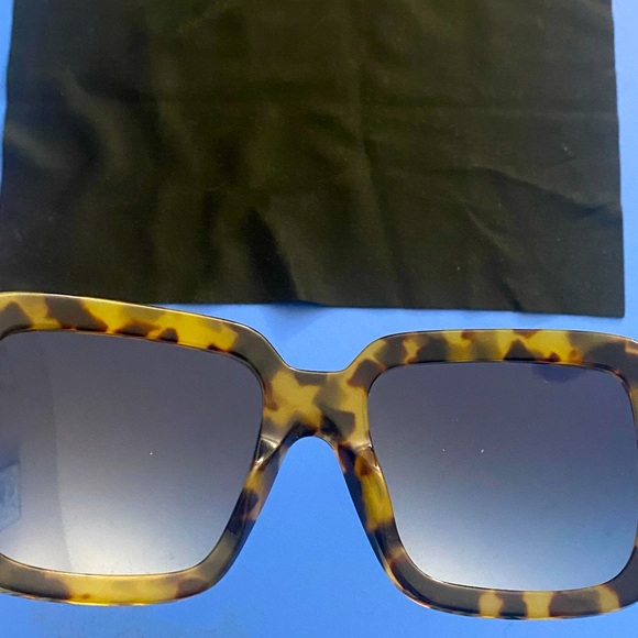 Prada Sunglasses - Picture 1 of 5